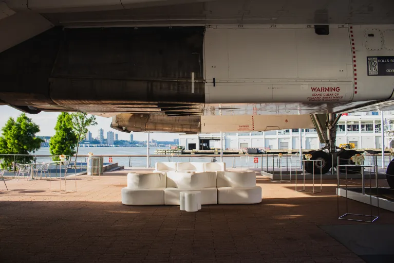 White lounge furniture under the Concorde for a Concorde Plaza reception